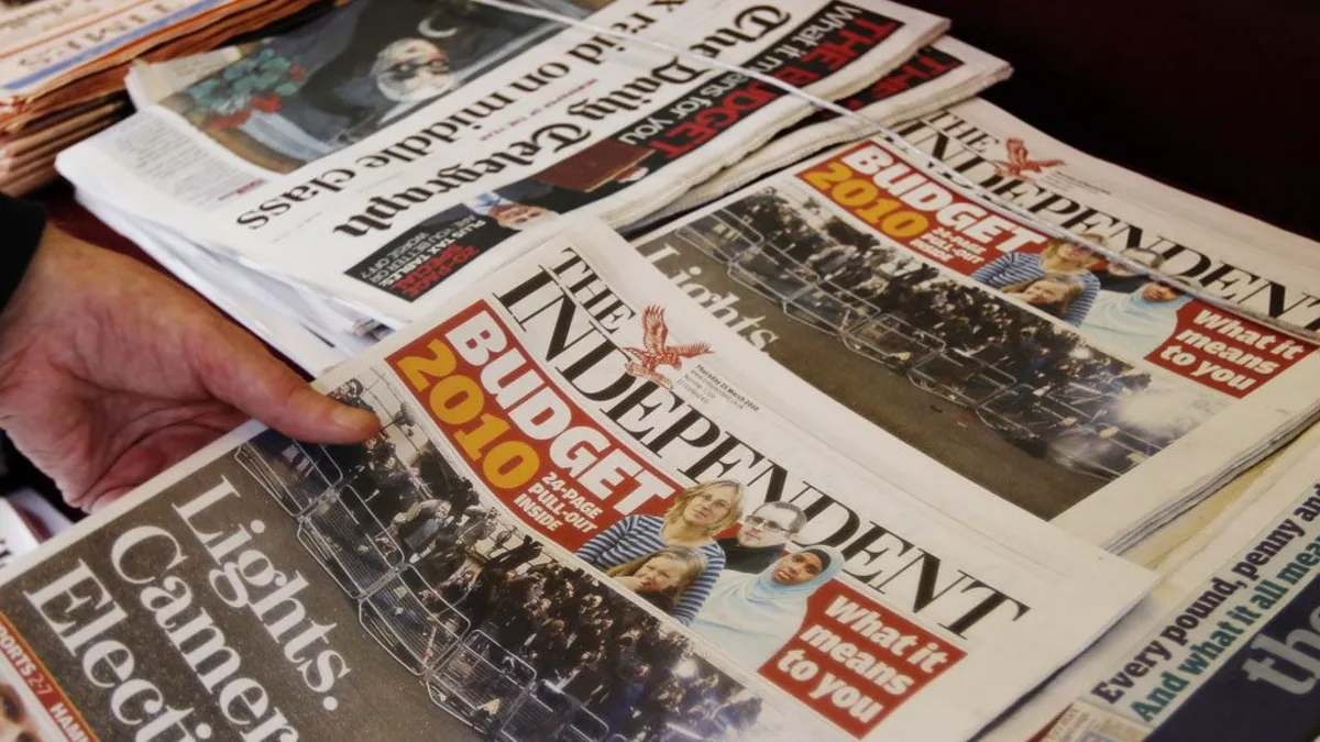 How does the newspaper help to improve English?